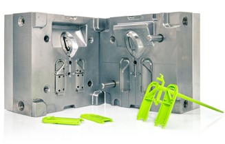 Aluminum tool with neon green prototype part